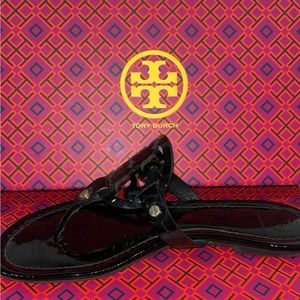 AUTHENTIC One Tory Burch black sandal (right sandal)